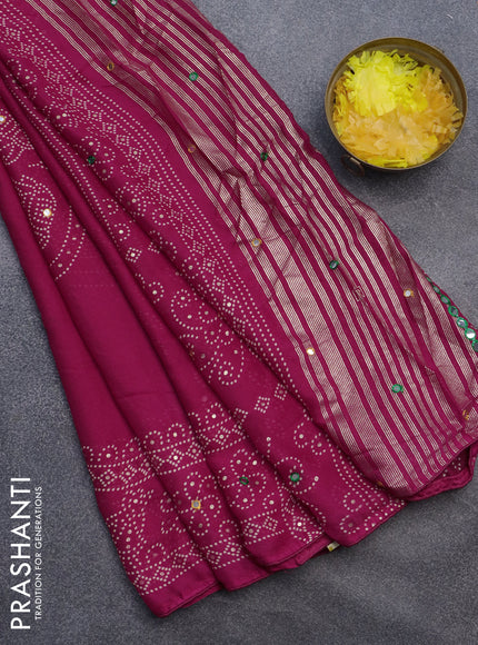 Semi georgette saree pink with allover bandhani prints and mirror work printed border