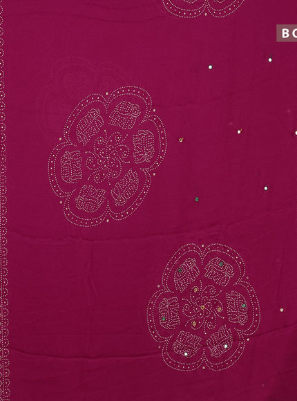 Semi georgette saree pink with allover bandhani prints and mirror work printed border