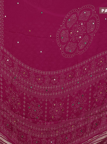 Semi georgette saree pink with allover bandhani prints and mirror work printed border