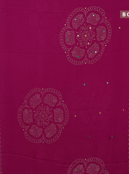 Semi georgette saree pink with allover bandhani prints and mirror work printed border