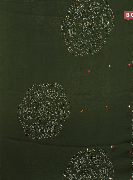 Semi georgette saree sap green with allover bandhani prints and mirror work printed border