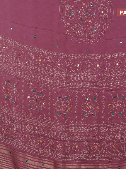 Semi georgette saree pastel pink shade with allover bandhani prints and mirror work printed border