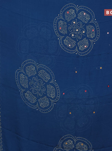 Semi georgette saree peacock blue with allover bandhani prints and mirror work printed border