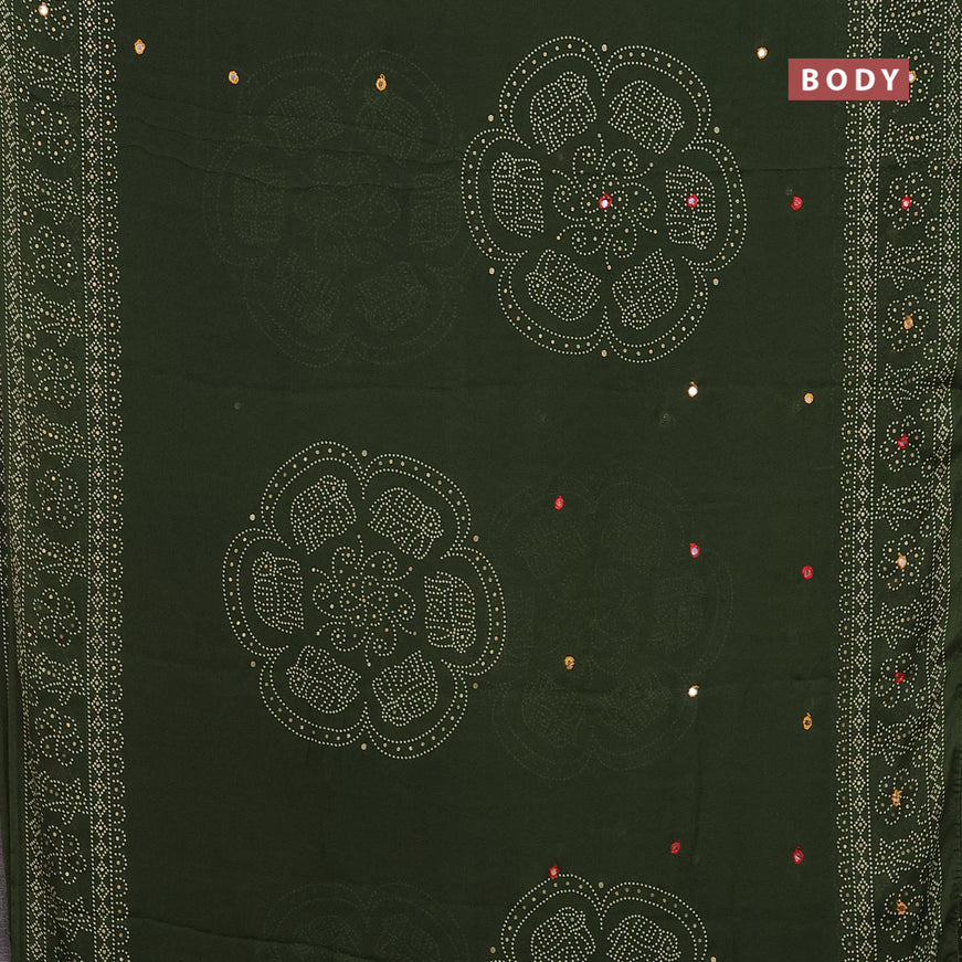 Semi georgette saree sap green with allover bandhani prints and mirror work printed border