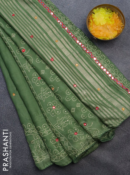 Semi georgette saree pastel green with allover bandhani prints and mirror work printed border