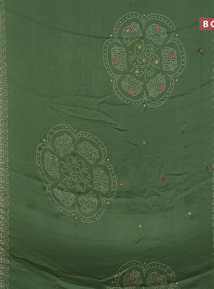 Semi georgette saree pastel green with allover bandhani prints and mirror work printed border