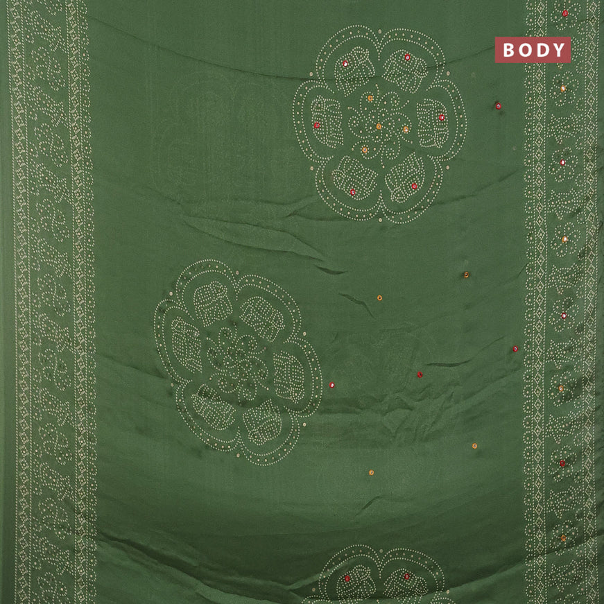 Semi georgette saree pastel green with allover bandhani prints and mirror work printed border