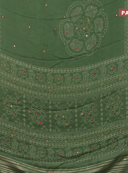 Semi georgette saree pastel green with allover bandhani prints and mirror work printed border