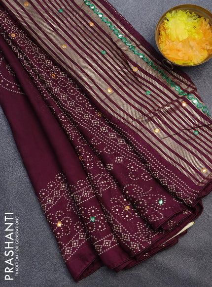 Semi georgette saree wine shade with allover bandhani prints and mirror work printed border