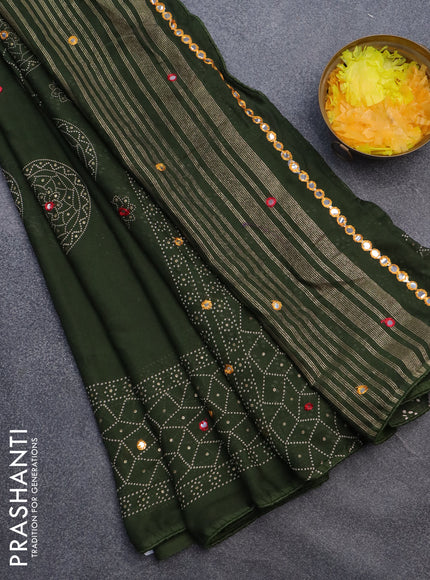 Semi georgette saree sap green with allover bandhani prints and mirror work printed border