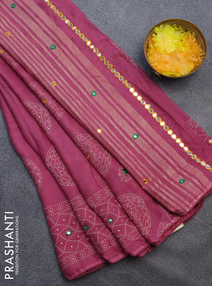 Semi georgette saree mauve pink with allover bandhani prints and mirror work printed border