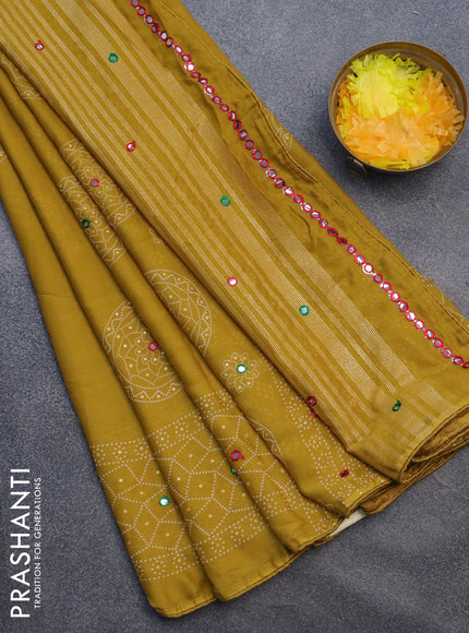 Semi georgette saree mustard yellow with allover bandhani prints and mirror work printed border