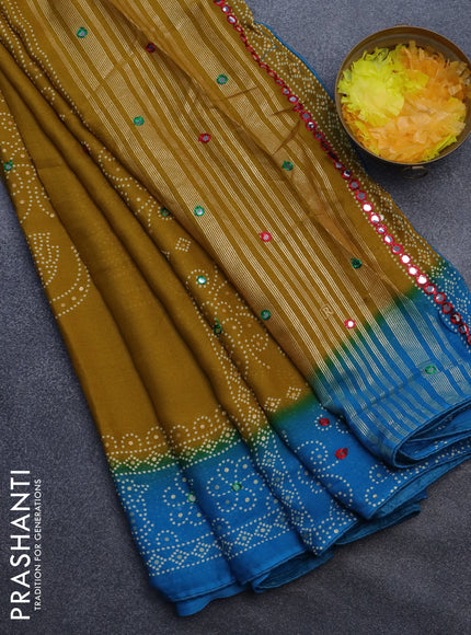 Semi georgette saree dark mustard and cs blue with allover bandhani prints and mirror work printed border