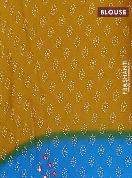 Semi georgette saree dark mustard and cs blue with allover bandhani prints and mirror work printed border