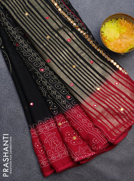 Semi georgette saree black and reddish pink with allover bandhani prints and mirror work printed border