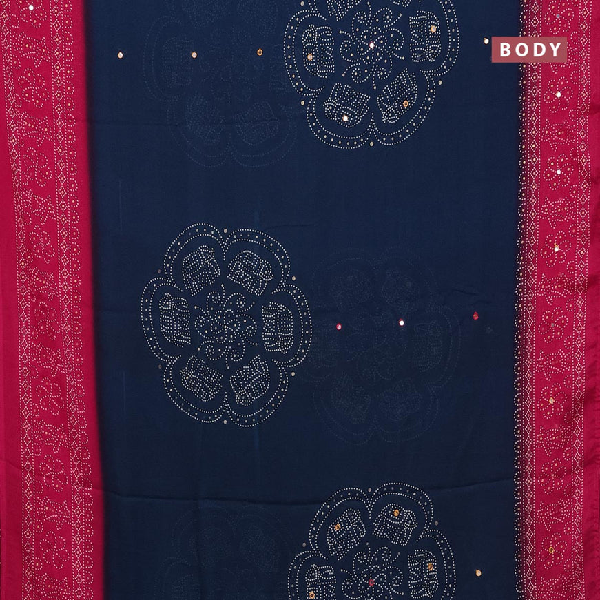 Semi georgette saree dark peaock blue and pink with allover bandhani prints and mirror work printed border