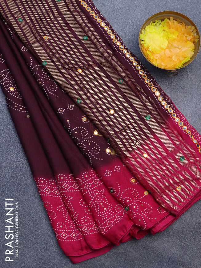 Semi georgette saree wine shade and pink with allover bandhani prints and mirror work printed border