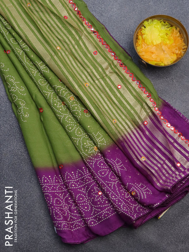 Semi georgette saree light green and violet with allover bandhani prints and mirror work printed border