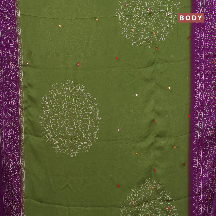 Semi georgette saree light green and violet with allover bandhani prints and mirror work printed border