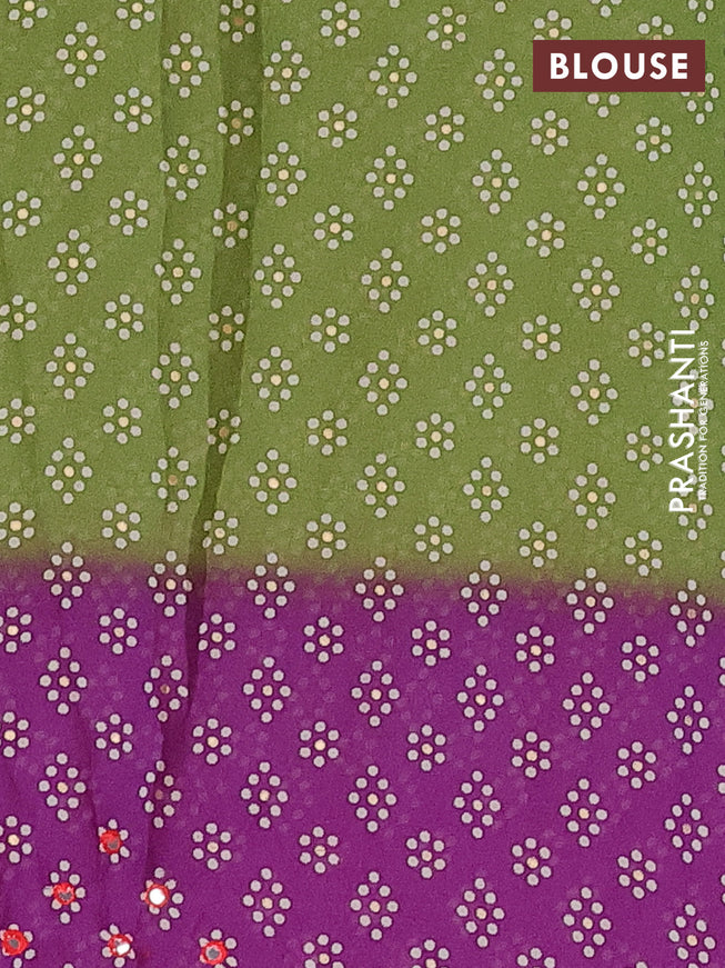 Semi georgette saree light green and violet with allover bandhani prints and mirror work printed border