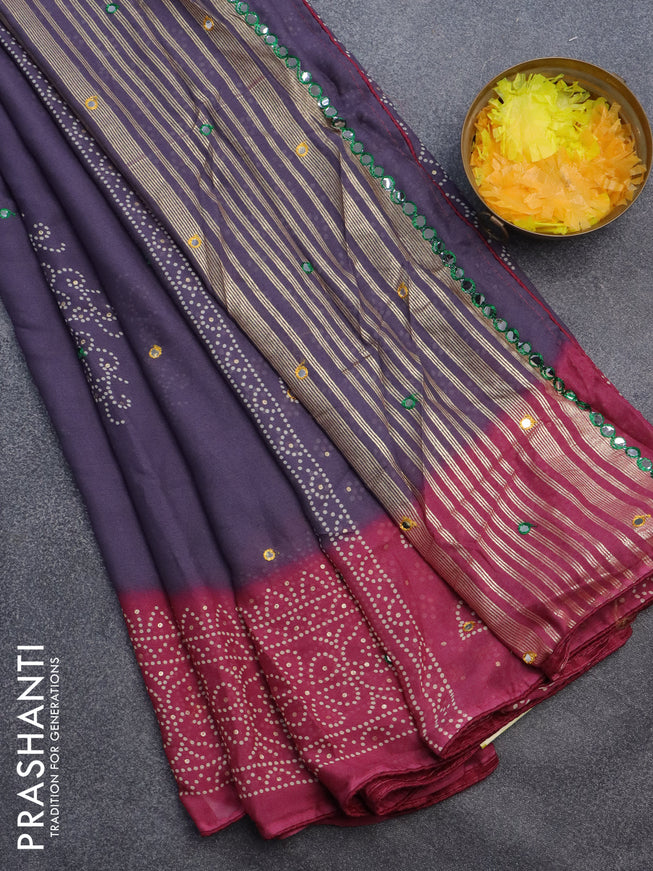 Semi georgette saree grey and onion pink with allover bandhani prints and mirror work printed border