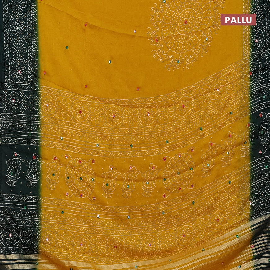 Semi georgette saree mustard yellow and bottle green with allover bandhani prints and mirror work printed border