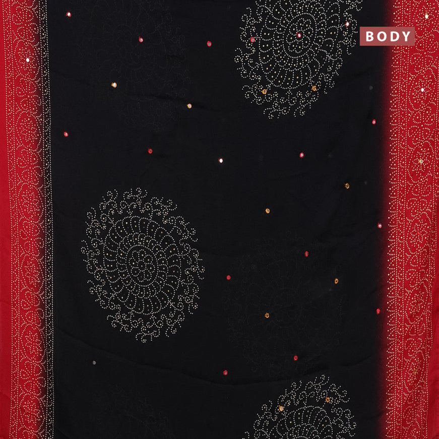 Semi georgette saree black and red with allover bandhani prints and mirror work printed border