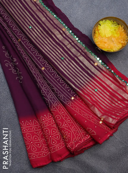 Semi georgette saree wine shade and dark pink with allover bandhani prints and mirror work printed border