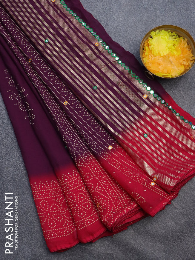 Semi georgette saree wine shade and dark pink with allover bandhani prints and mirror work printed border