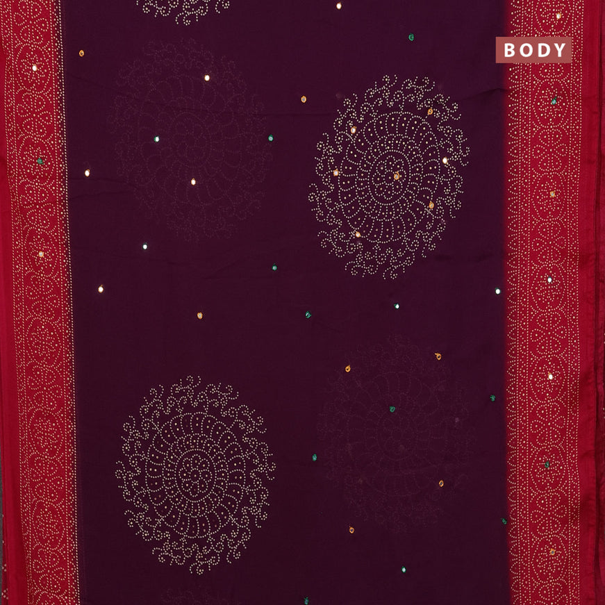 Semi georgette saree wine shade and dark pink with allover bandhani prints and mirror work printed border