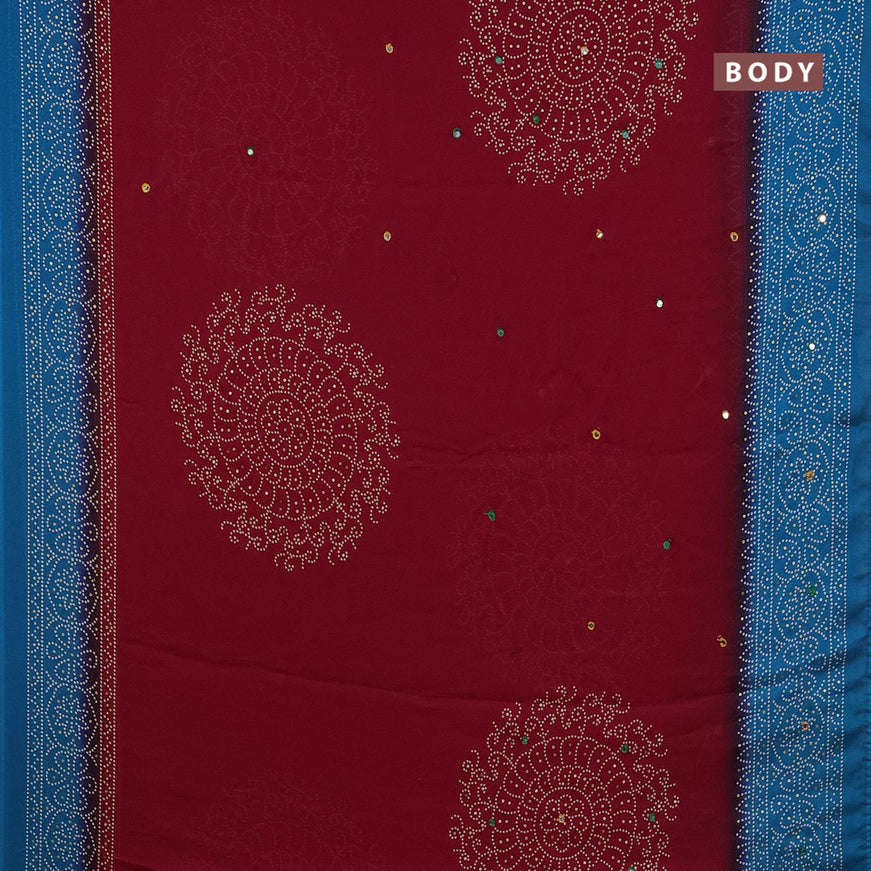 Semi georgette saree kumkum red and cs blue with allover bandhani prints and mirror work printed border