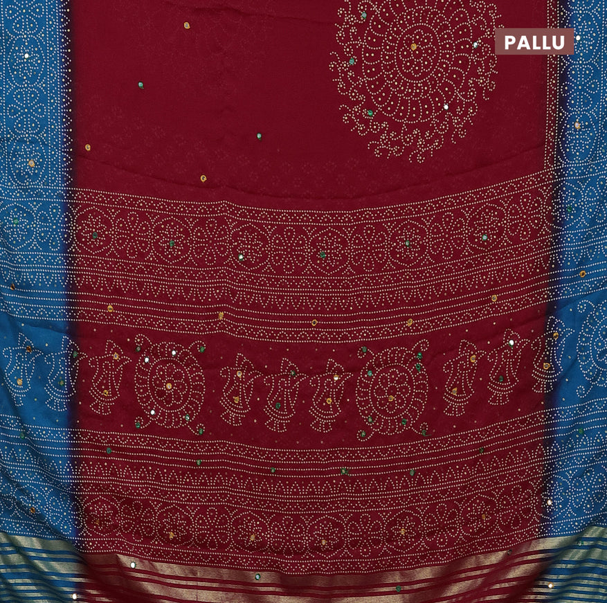 Semi georgette saree kumkum red and cs blue with allover bandhani prints and mirror work printed border