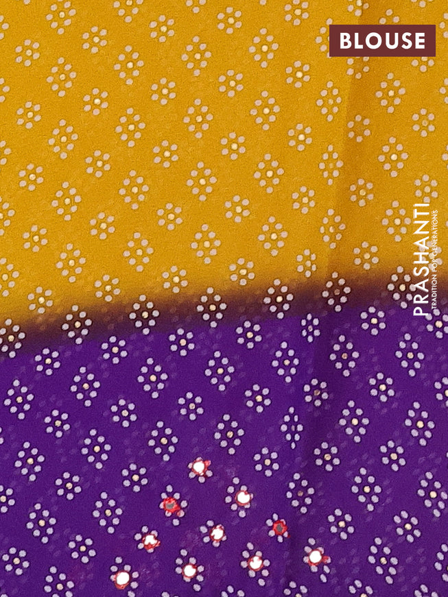 Semi georgette saree yellow and violet with allover bandhani prints and mirror work printed border