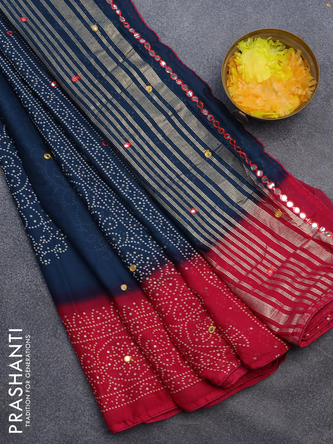 Semi georgette saree peacock blue and pink with allover bandhani prints and mirror work printed border