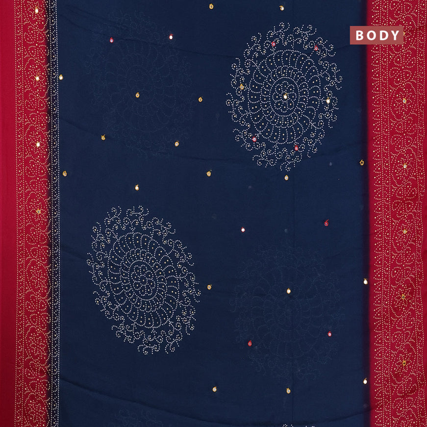 Semi georgette saree peacock blue and pink with allover bandhani prints and mirror work printed border