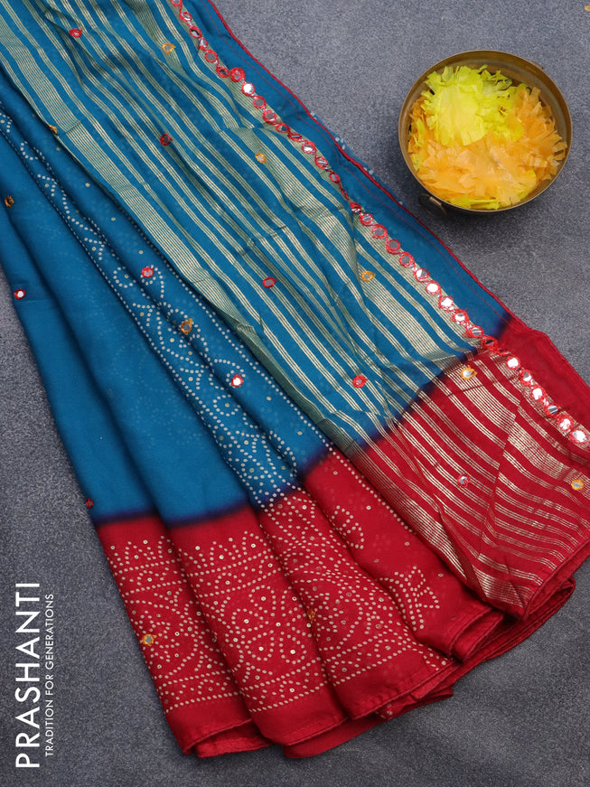 Semi georgette saree cs blue and red with allover bandhani prints and mirror work printed border