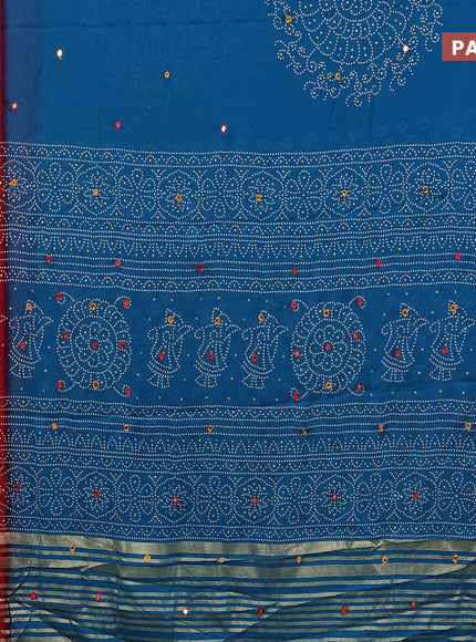 Semi georgette saree cs blue and red with allover bandhani prints and mirror work printed border