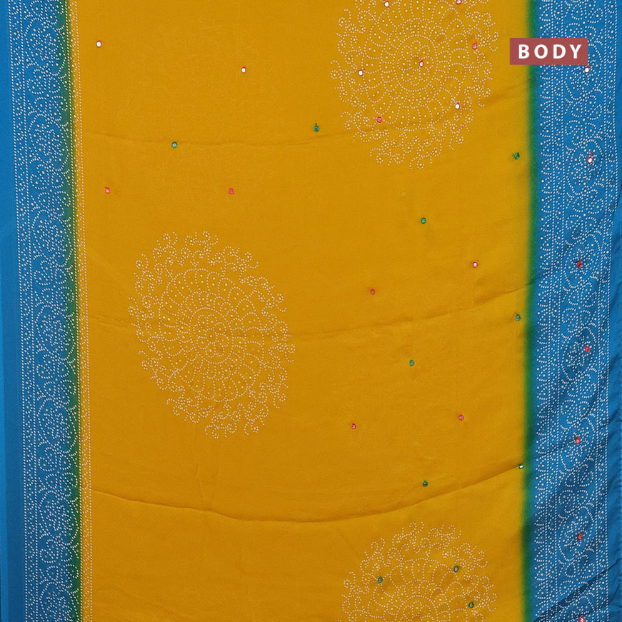 Semi georgette saree yellow and cs blue with allover bandhani prints and mirror work printed border