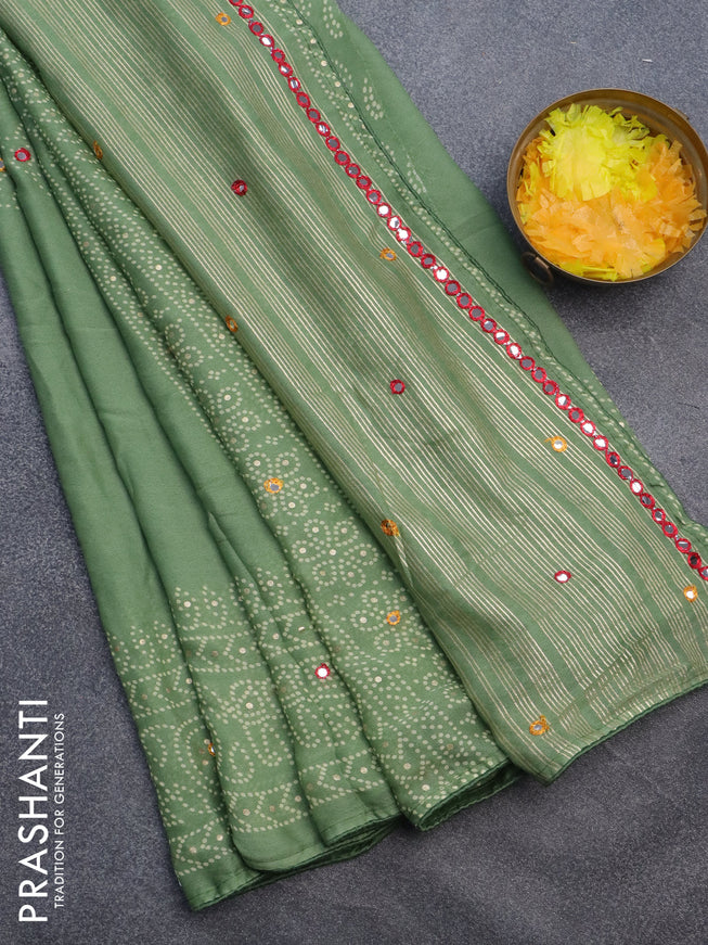 Semi georgette saree pastel green with allover bandhani prints and mirror work printed border