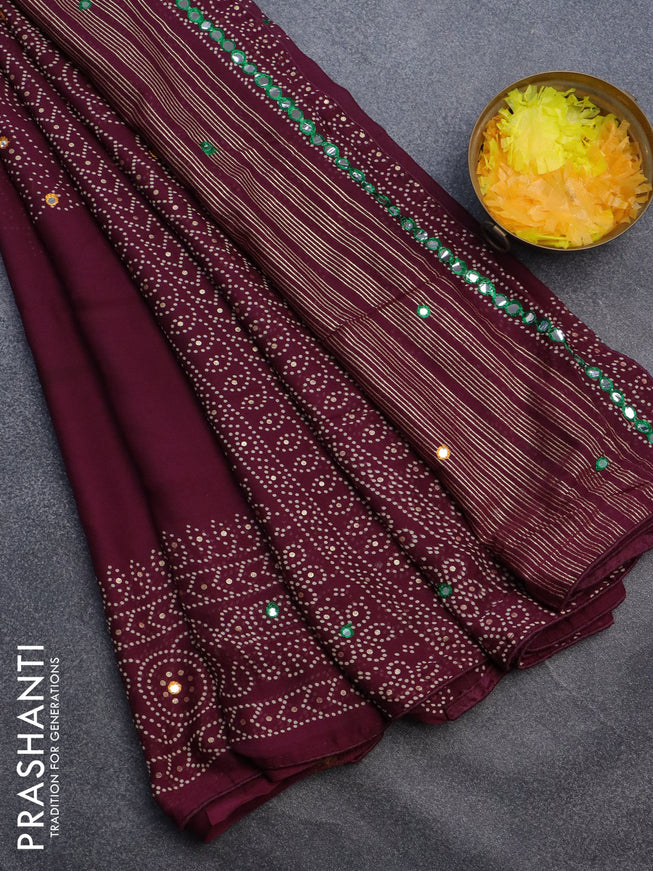 Semi georgette saree wine shade with allover bandhani prints and mirror work printed border