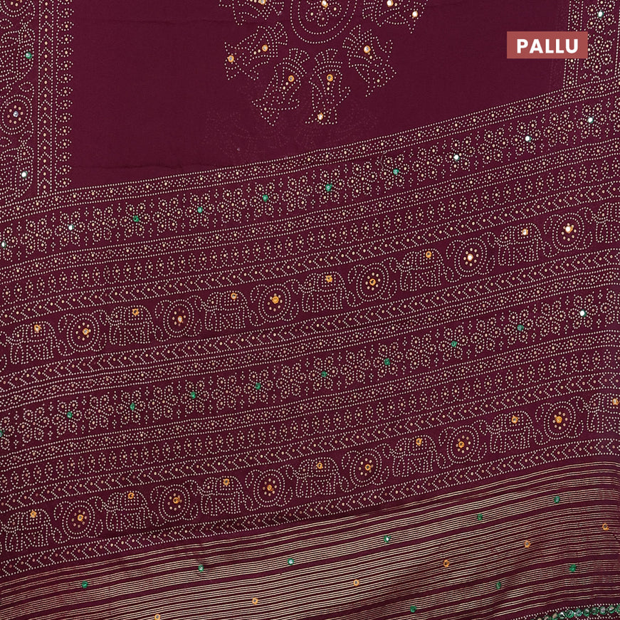 Semi georgette saree wine shade with allover bandhani prints and mirror work printed border