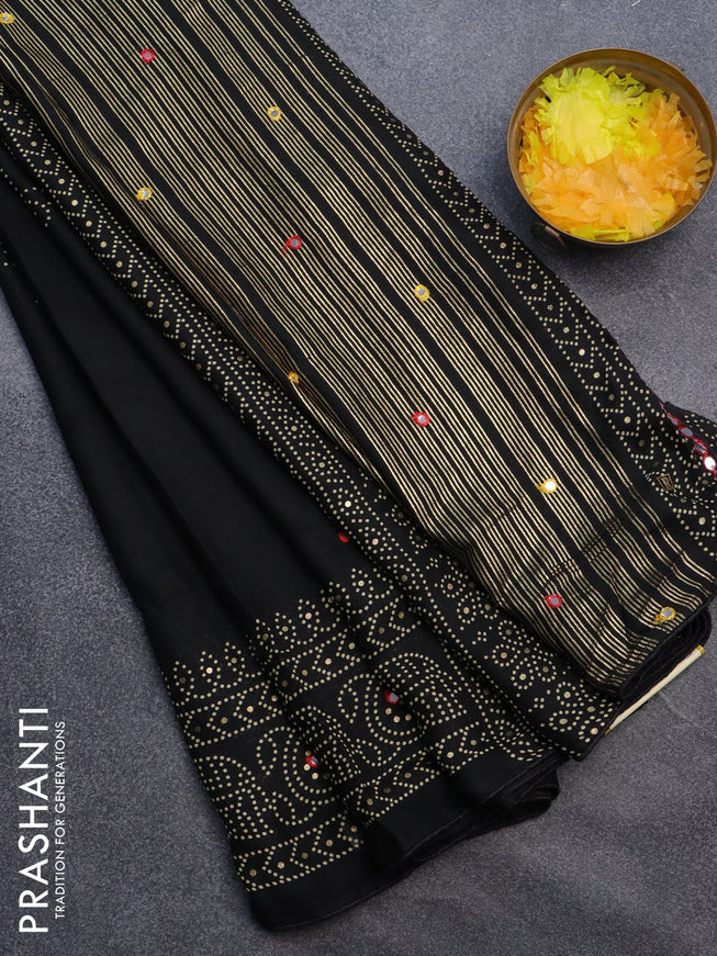 Semi georgette saree black with allover bandhani prints and mirror work printed border