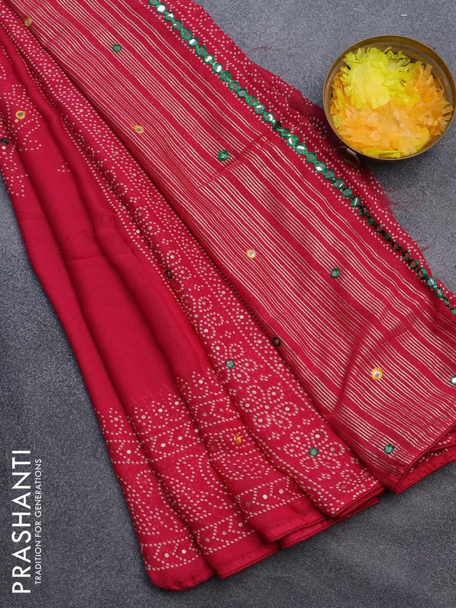 Semi georgette saree dark pink with allover bandhani prints and mirror work printed border