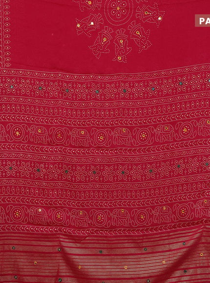 Semi georgette saree dark pink with allover bandhani prints and mirror work printed border