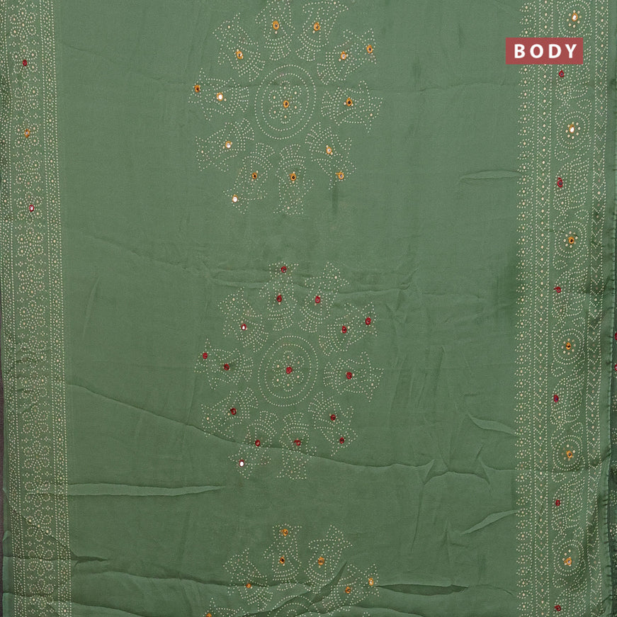 Semi georgette saree pastel green with allover bandhani prints and mirror work printed border