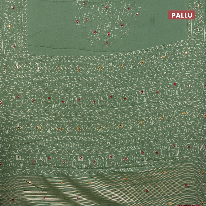 Semi georgette saree pastel green with allover bandhani prints and mirror work printed border