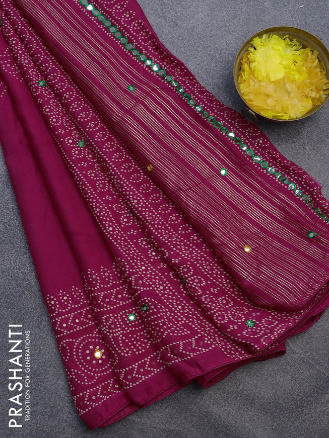 Semi georgette saree pink with allover bandhani prints and mirror work printed border