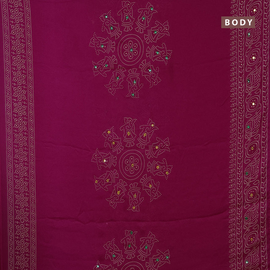 Semi georgette saree pink with allover bandhani prints and mirror work printed border