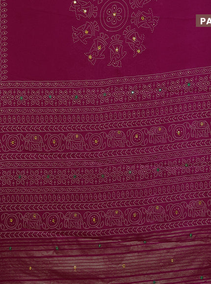 Semi georgette saree pink with allover bandhani prints and mirror work printed border