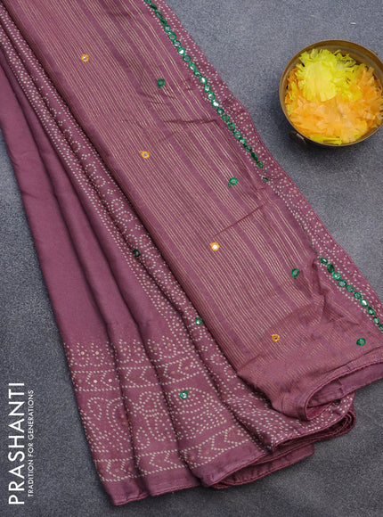 Semi georgette saree mauve pink with allover bandhani prints and mirror work printed border